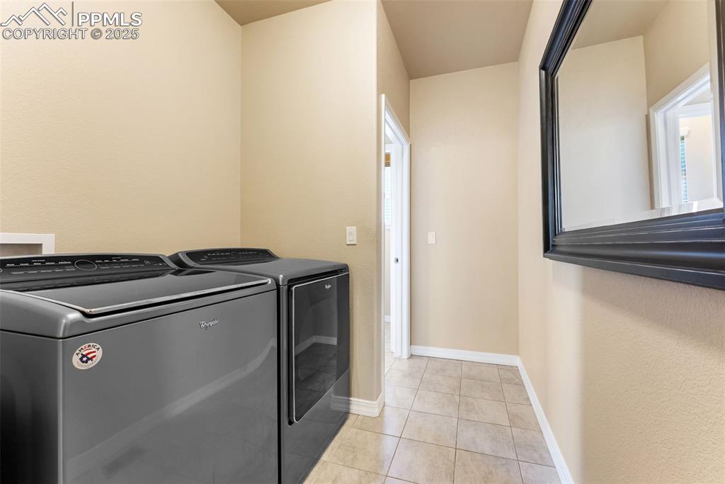 Image 24 of 50: Laundry room off master and mud room