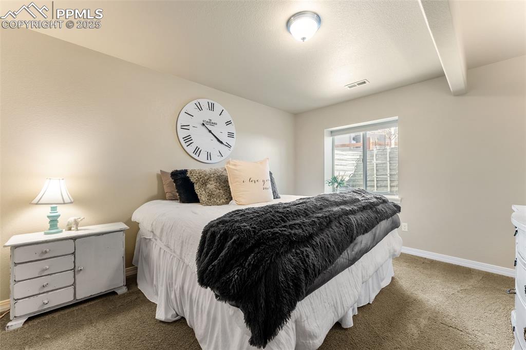 Image 33 of 50: Large basement bedroom #1