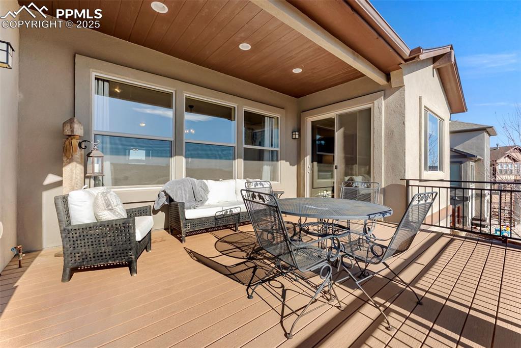 Image 38 of 50: Composite deck with outdoor dining space