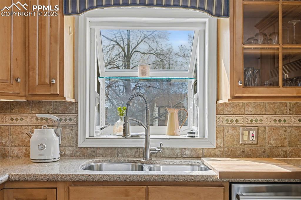 Image 15 of 42: Kitchen sink with garden window