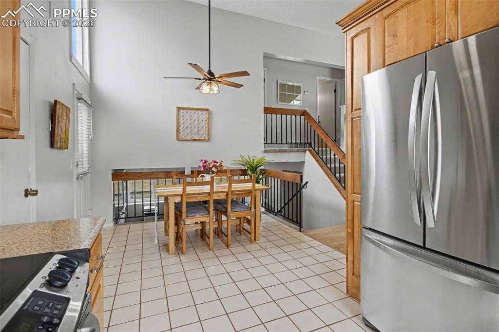 Image 16 of 42: View into dining area from kitchen