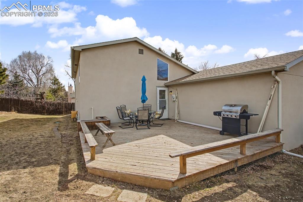 Image 31 of 42: View of deck from backyard