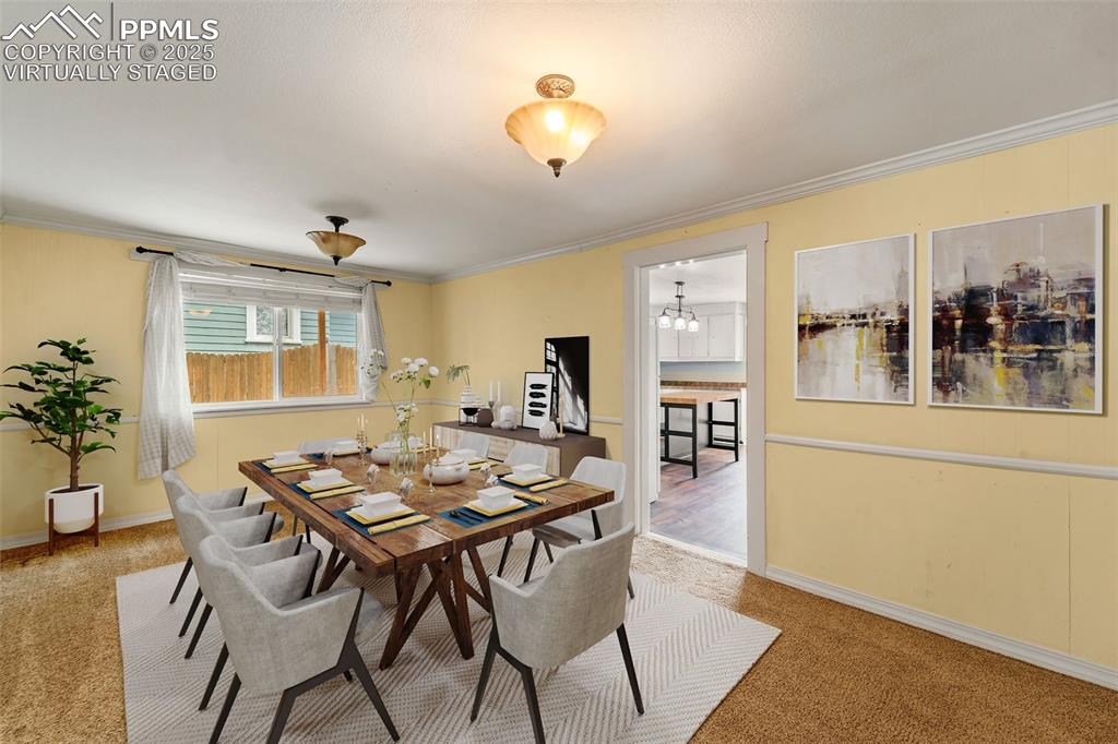 Image 25 of 48: Virtually Staged / Dining Area space adjacent to the kitchen.