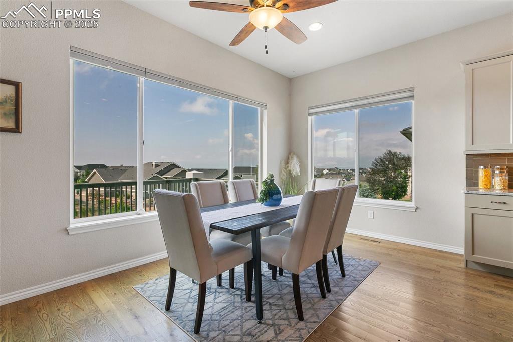 Image 12 of 41: Dining room with plenty of natural light, light wood-style floors, and ceil