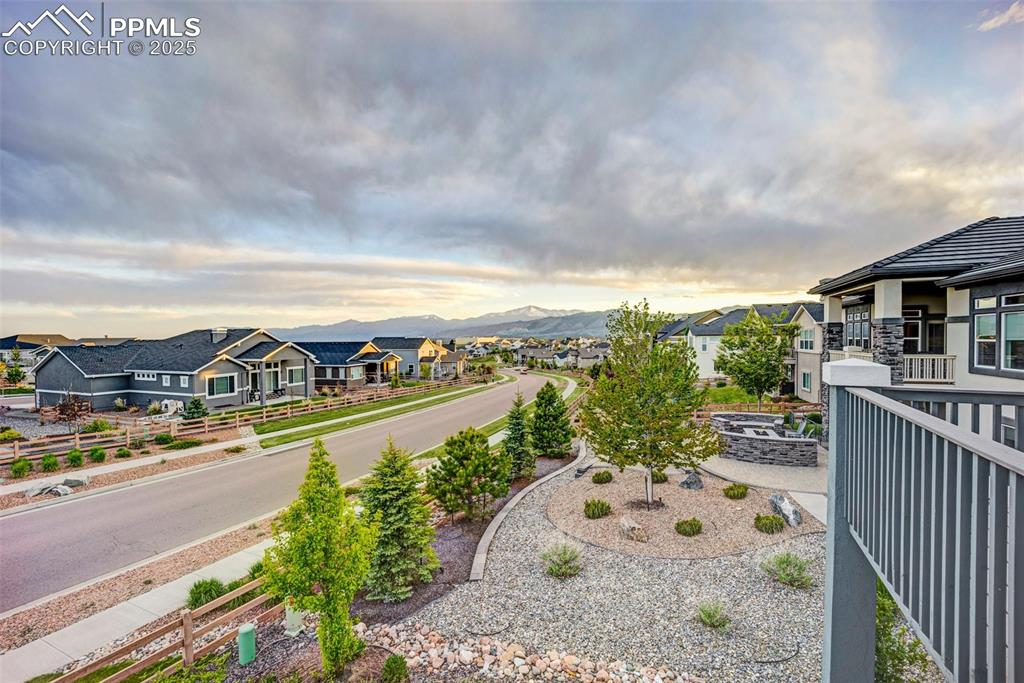 Image 35 of 41: View of yard with a residential view and a mountain view