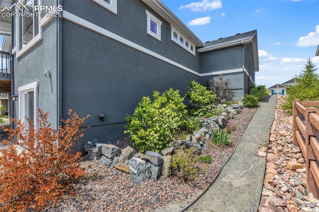 Image 38 of 41: View of property exterior featuring stucco siding