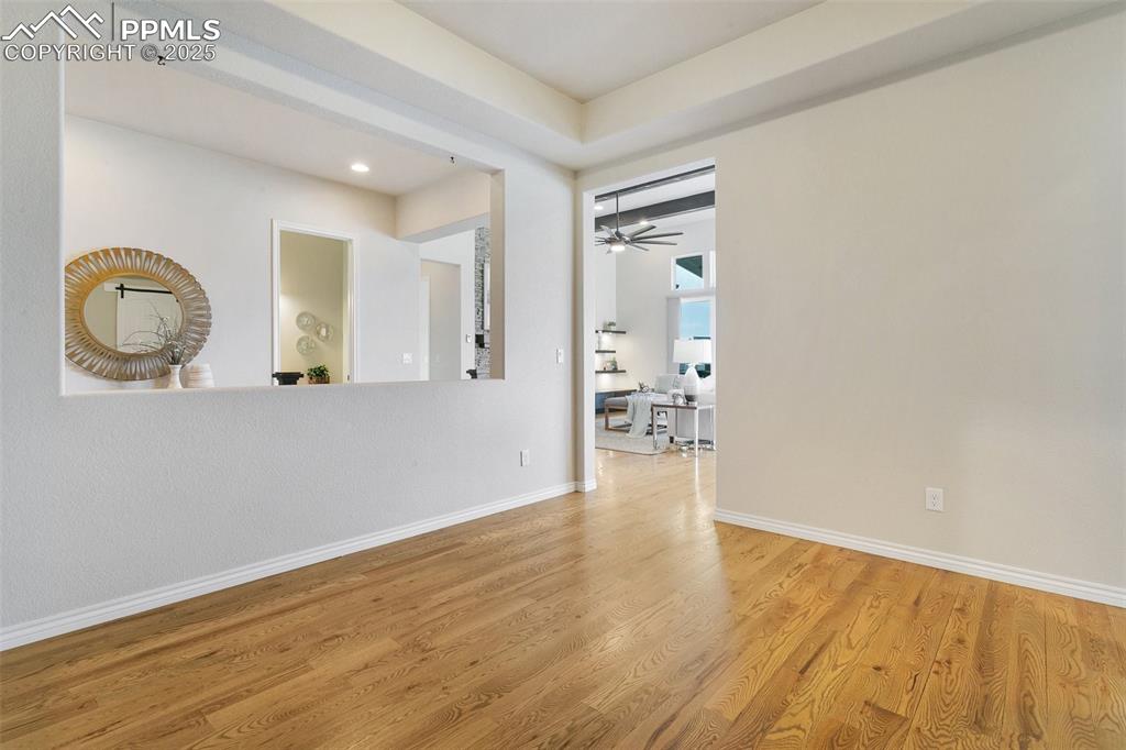 Image 6 of 41: Spare room featuring light wood-type flooring, recessed lighting, and a cei