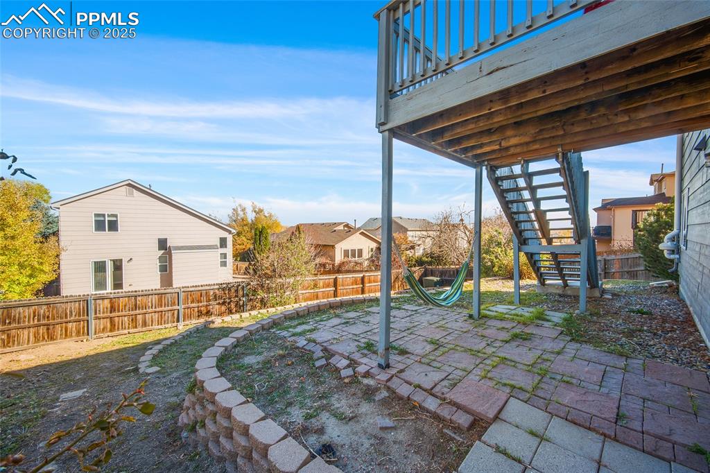 Image 29 of 47: Fenced backyard 