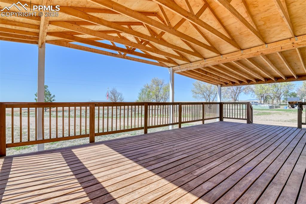 Image 16 of 39: Expansive front deck