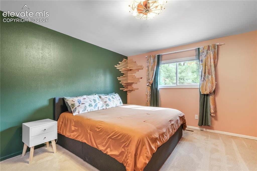 Image 17 of 50: Primary bedroom upper level
