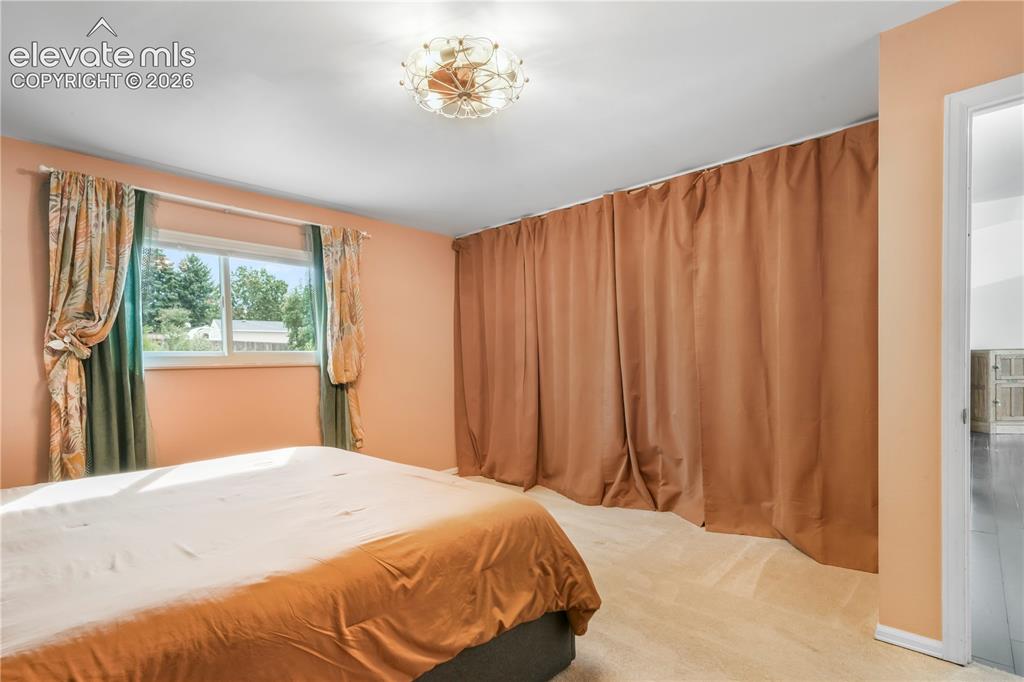 Image 18 of 50: Primary bedroom upper level