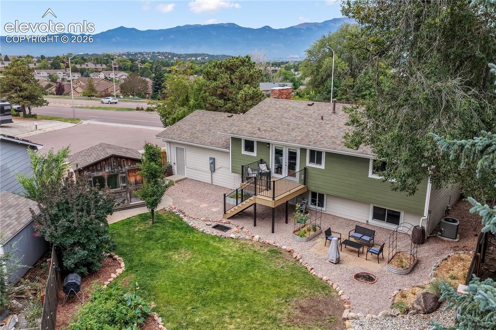 Image 34 of 50: Back yard with entertaining areas, shed, landscaped, garden areas and priva