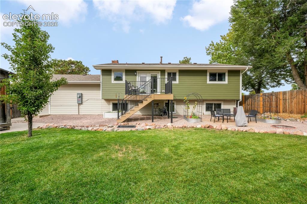 Image 35 of 50: Back yard with entertaining areas, shed, landscaped, garden areas and priva