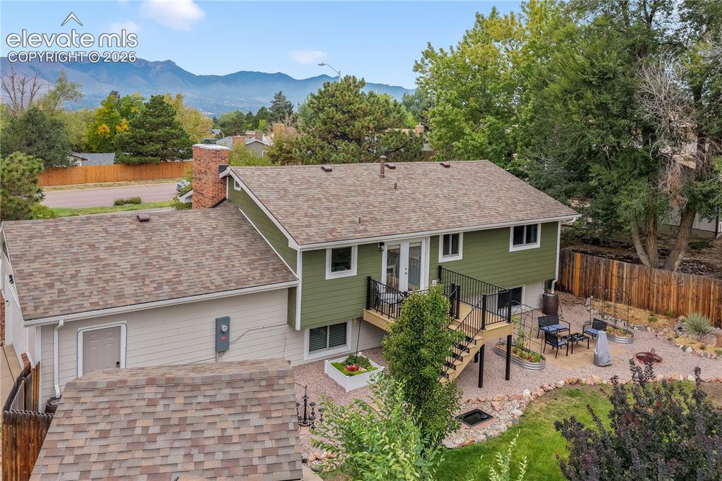 Image 37 of 50: Back yard with entertaining areas, shed, landscaped, garden areas and priva