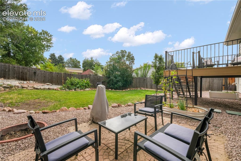 Image 40 of 50: Back yard with entertaining areas, shed, landscaped, garden areas and priva