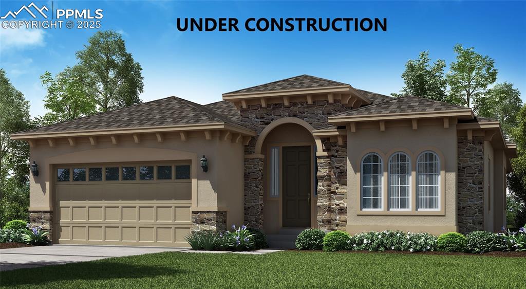 Caption: Mediterranean / spanish-style house with stone siding, stucco siding, and an attached garage