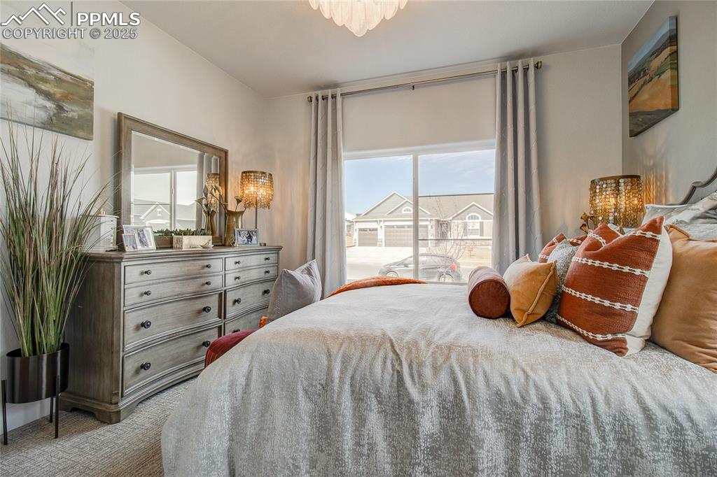 Image 14 of 30: View of carpeted bedroom