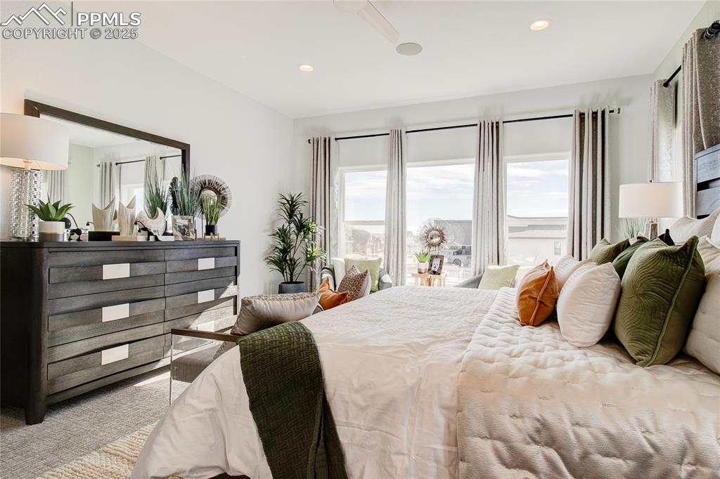 Image 15 of 30: Bedroom featuring recessed lighting