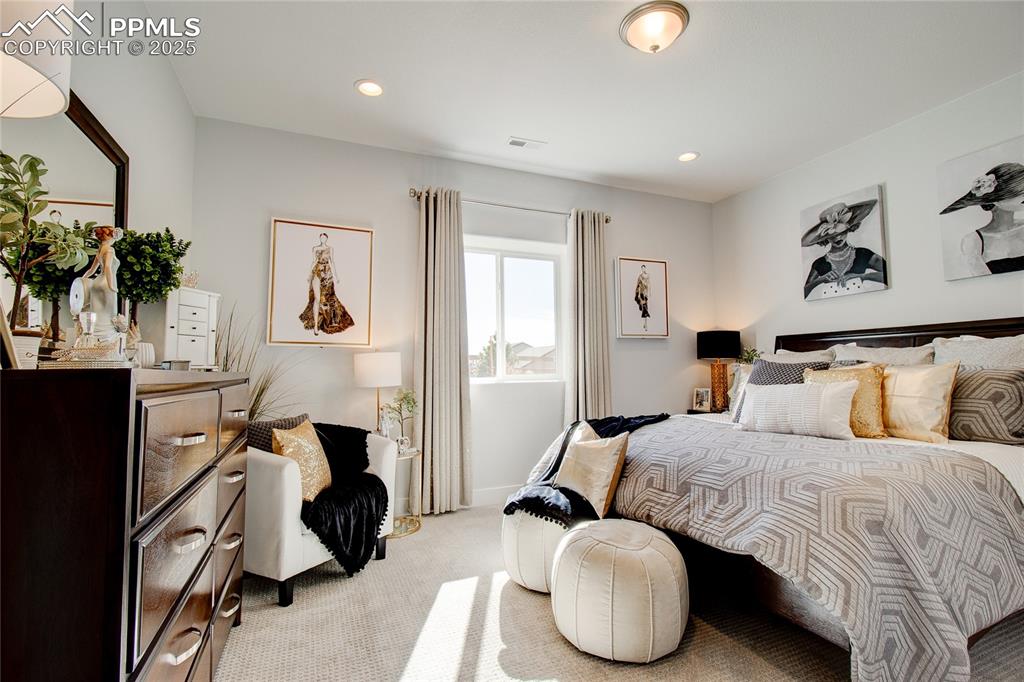 Image 26 of 30: Bedroom featuring light carpet, recessed lighting, and baseboards