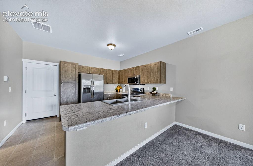 Image 9 of 38: Kitchen