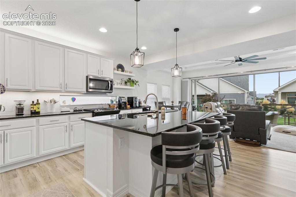 Image 13 of 34: Kitchen with Island seating 4