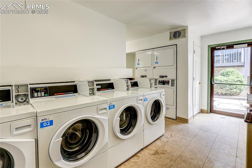 Image 12 of 20: Community laundry with app-operated machines.