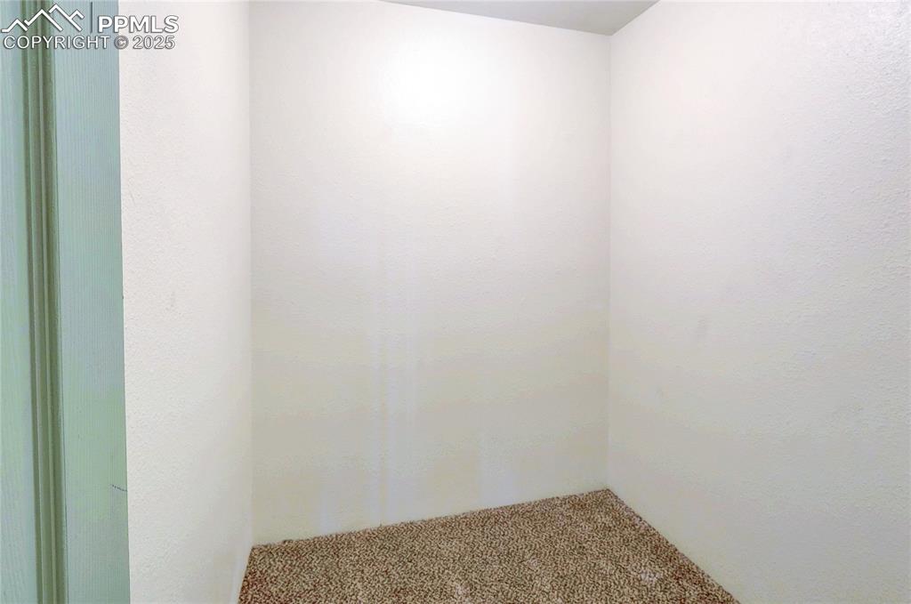 Image 14 of 20: Large storage closet could be converted to in-unit laundry.