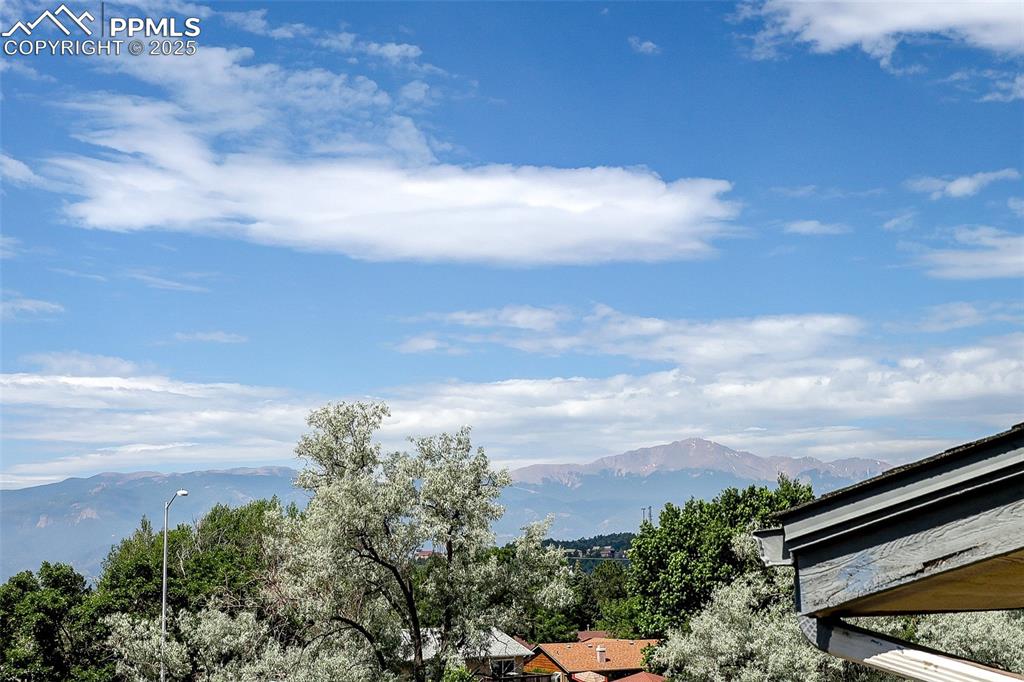 Image 4 of 20: View of Pikes Peak from the living room and deck.