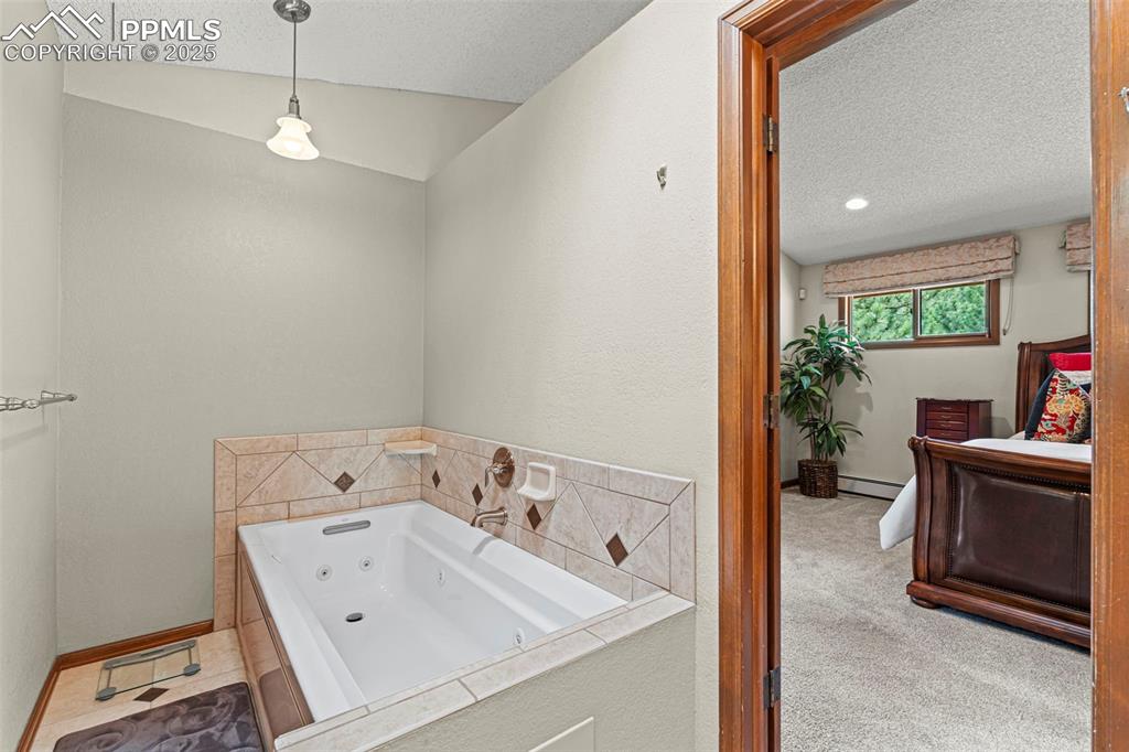 Image 28 of 49: his and hers bathrooms