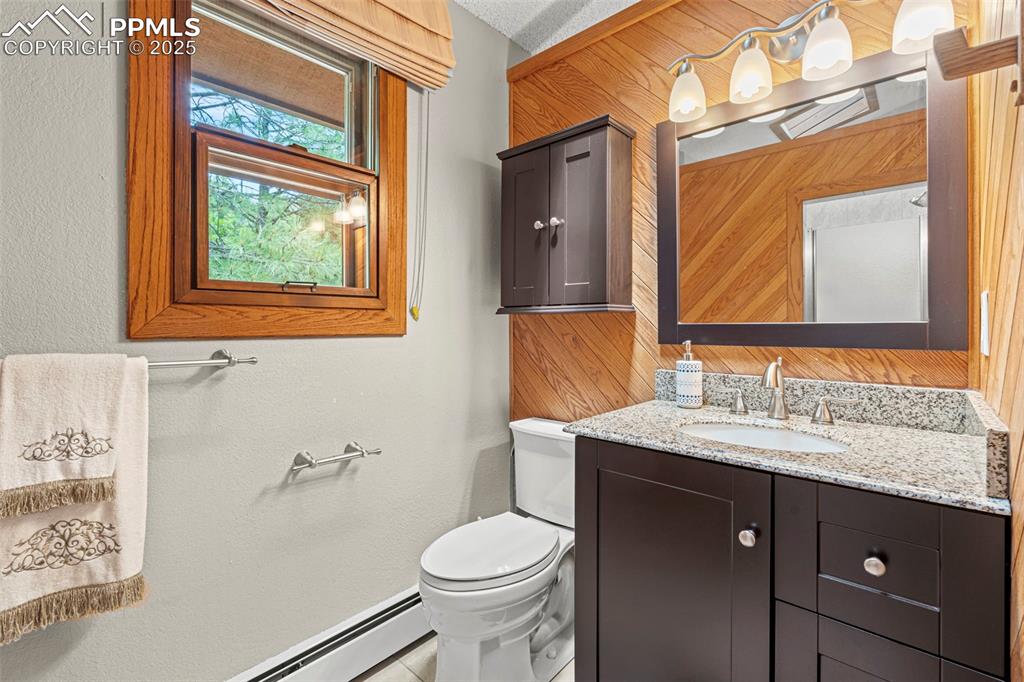 Image 29 of 49: his and hers bathrooms