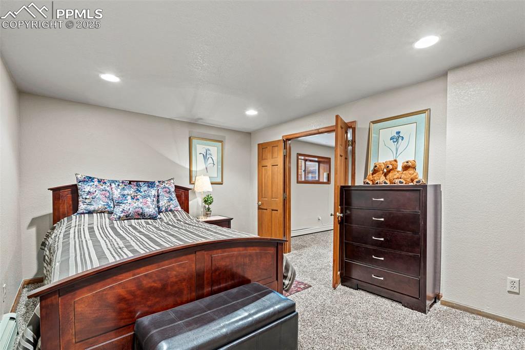 Image 34 of 49: basement bedroom