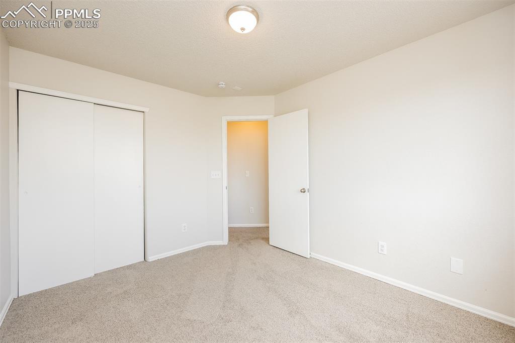 Image 19 of 28: Bedroom
