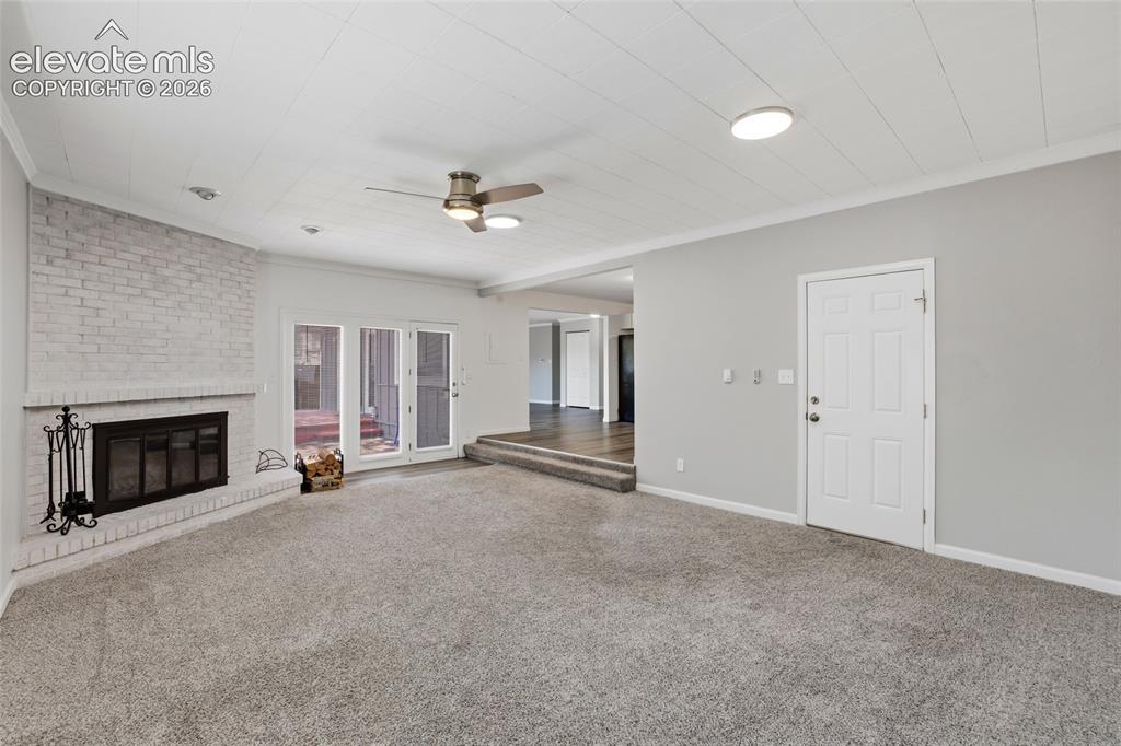 Image 18 of 43: Large Family room with walk-out to backyard