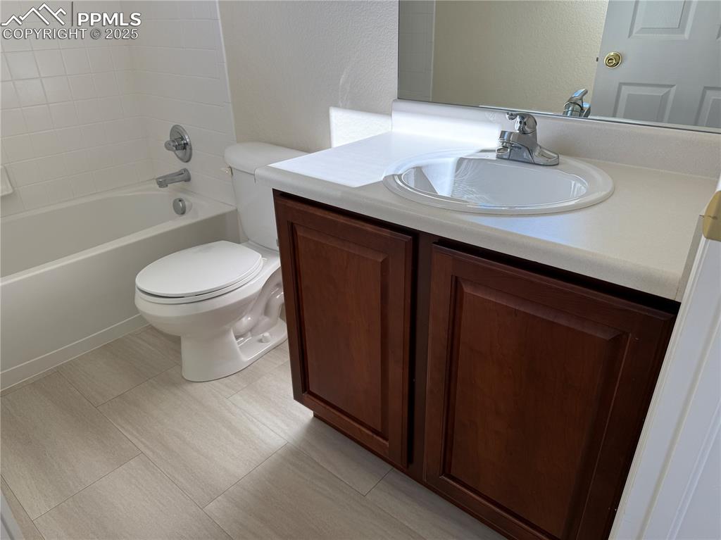 Image 24 of 32: Full bathroom featuring vanity, shower / washtub combination, and a texture