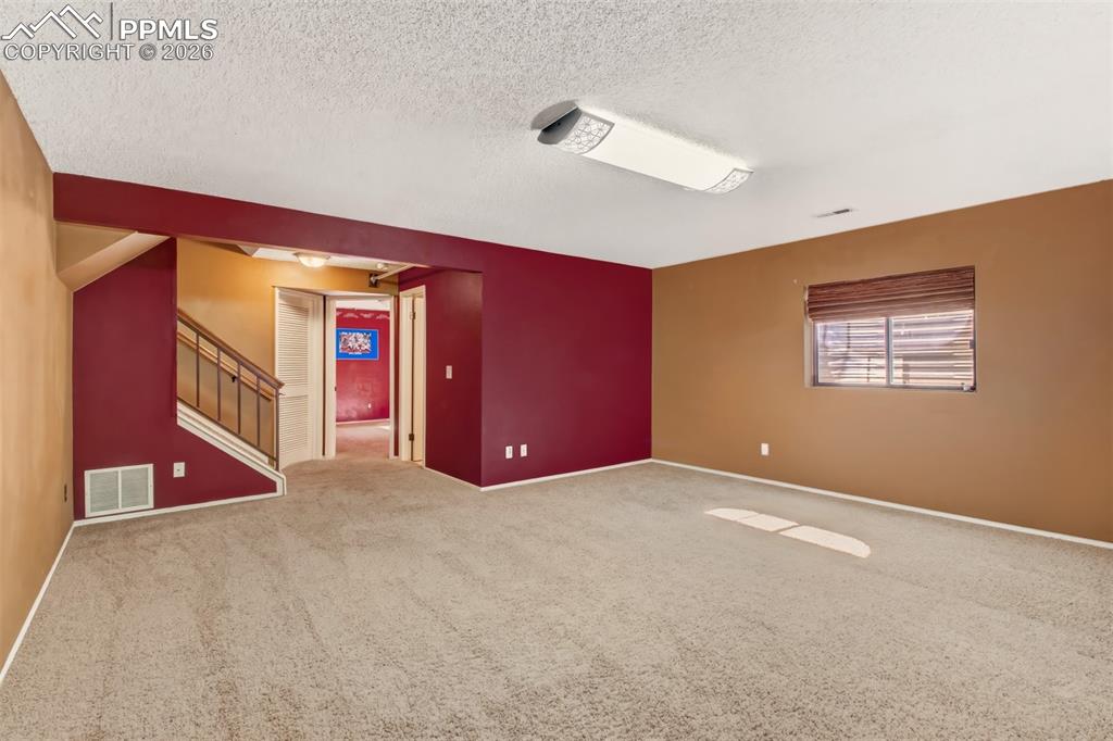 Image 28 of 35: Another view of the recreation room/2nd family room.