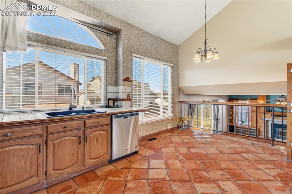 Image 7 of 35: Cozy eating area with another large picture window.