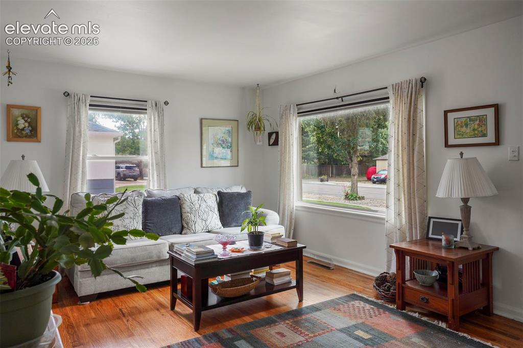 Image 3 of 23: Cozy Living Room with excellent natural light