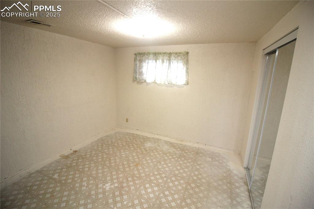Image 24 of 34: Bedroom
