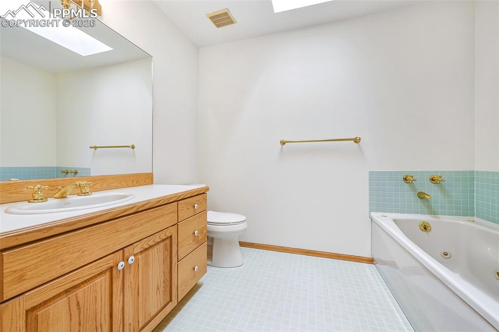 Image 25 of 50: hall bathroom