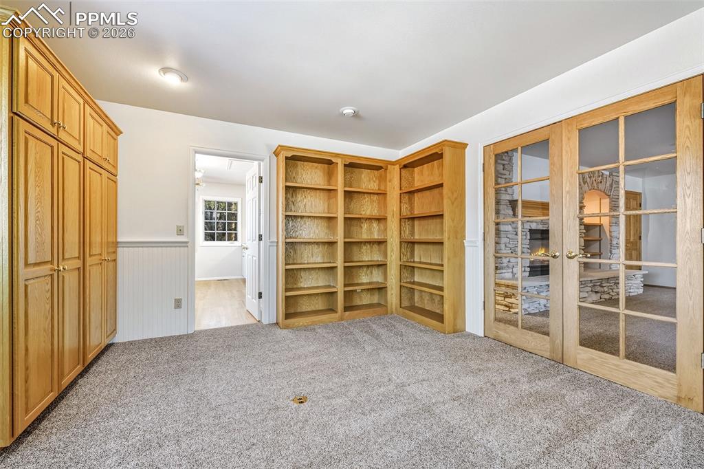 Image 27 of 50: Bedroom off of the Master Suite Could be an office, Flex room 1