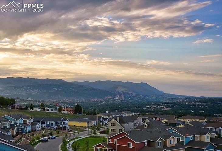 Image 2 of 28: Expansive mountain views surround the community, offering breathtaking back