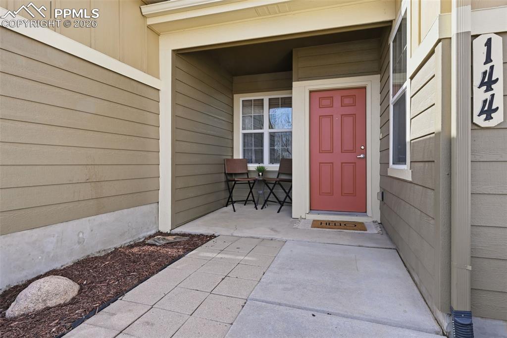 Image 3 of 28: Private fenced patio creates valuable outdoor living space — perfect for re