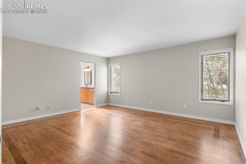 Image 17 of 35: Unfurnished room featuring light wood-type flooring and baseboards