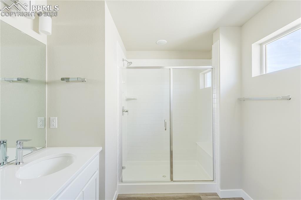 Image 25 of 46: Master bath with toilet room & walk-in double shower