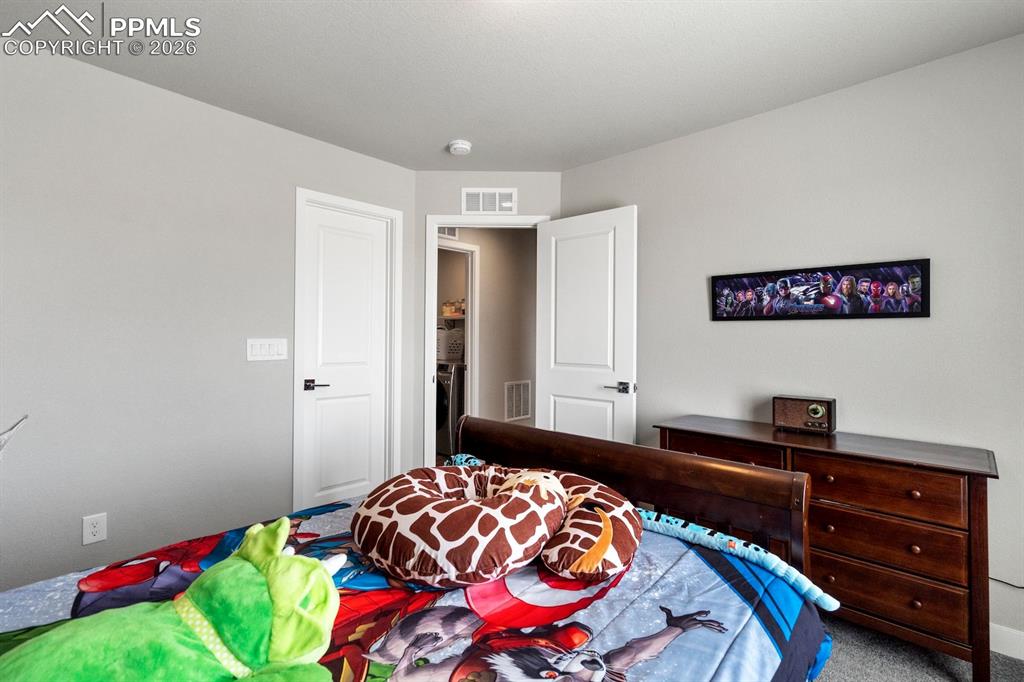 Image 38 of 45: Bedroom featuring carpet floors