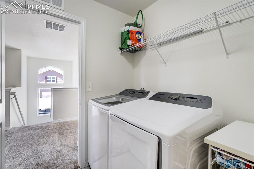 Image 40 of 45: Upstairs Laundry Room