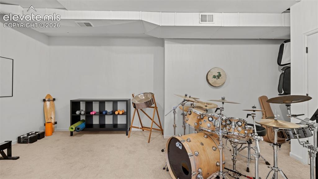 Image 31 of 45: Music studio and fitness area