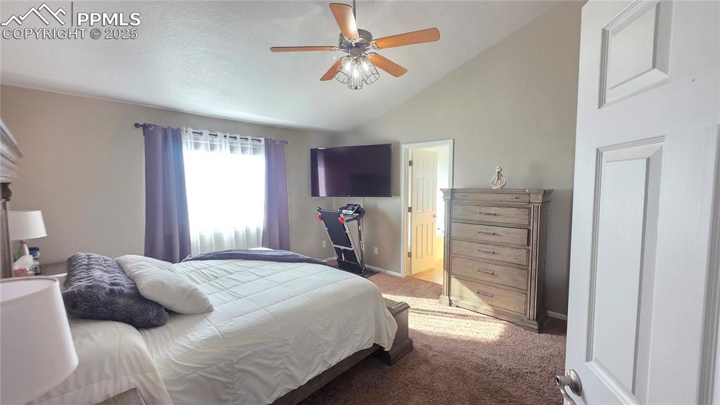 Image 19 of 34: Master with ceiling fan, and M. Bathroom