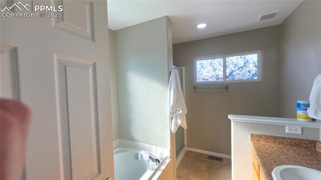 Image 23 of 34: Master Bathroom