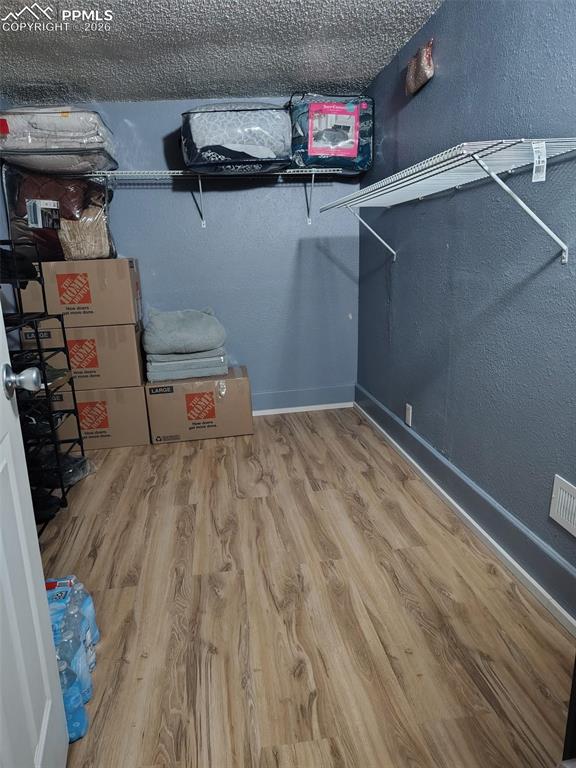 Image 28 of 28: Bedroom / Currently used as storage